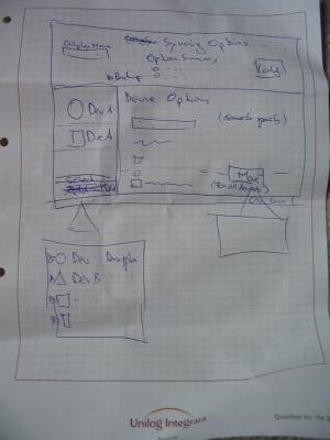 Photo of a sheet of paper showing the first part of the KitchenSync design