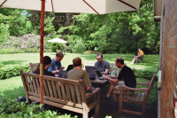 Photo of the group sitting in the garden and discussing the roadmap