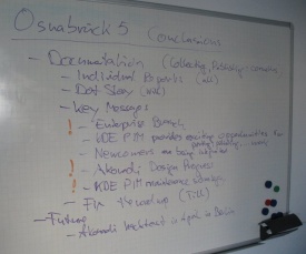Photo of meeting conclusions on whiteboard
